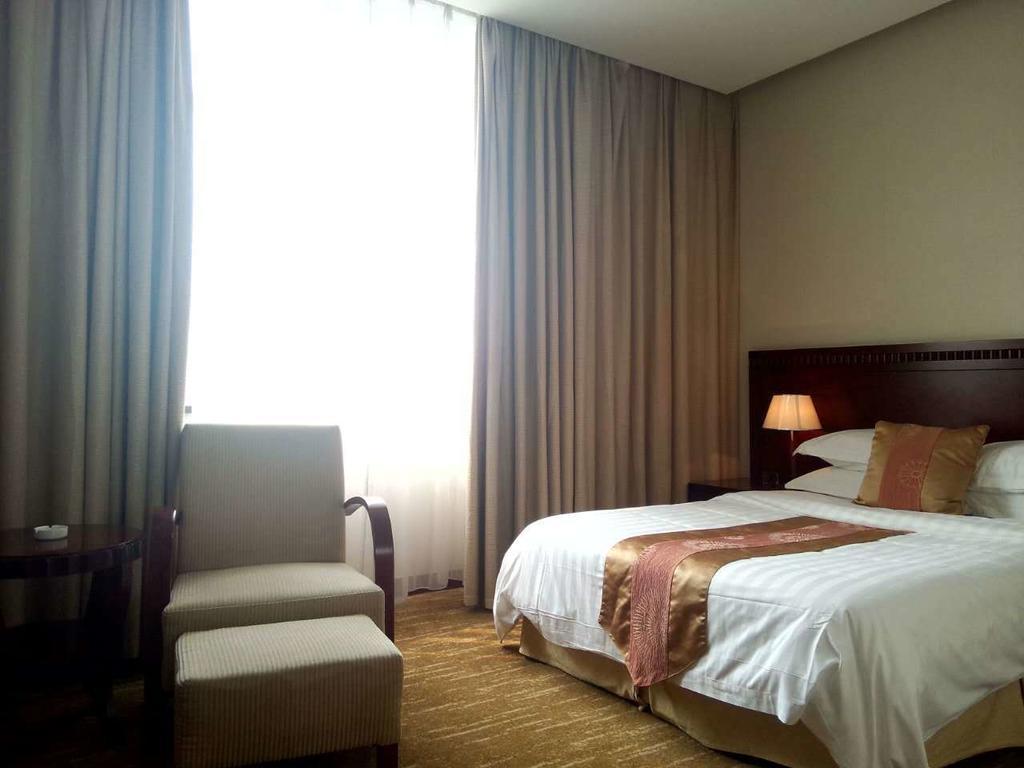 Century Hotel Taicang Chambre photo